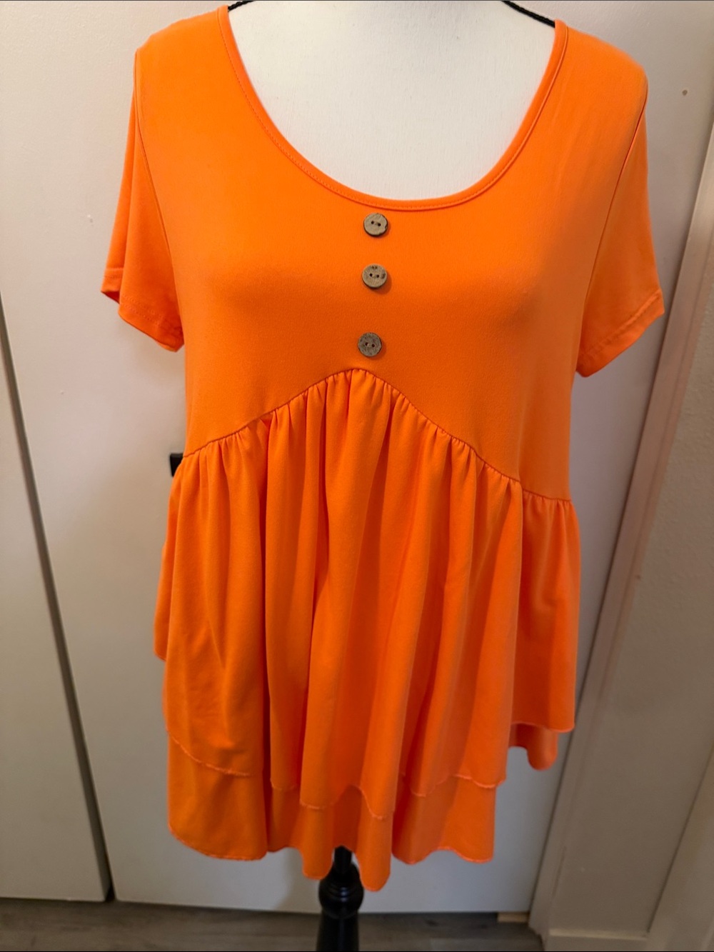 Women’s Scoop Neck Flutter Hem Top in Bright Orange